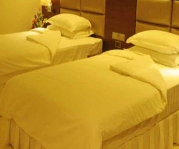 Alcor Hotel Jharkhand Jamshedpur twin bedroom